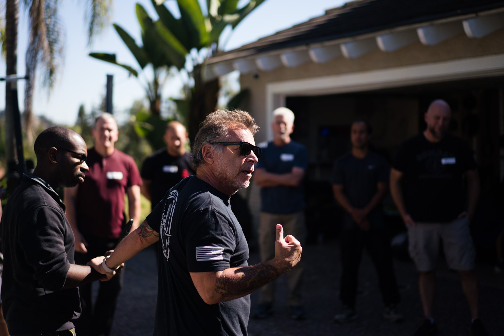 Tony Blauer coaching a small certification class